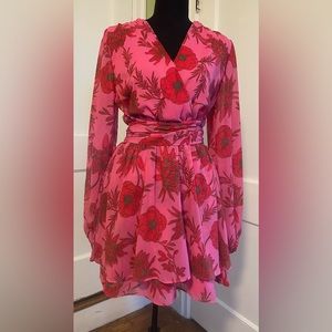 Beyond Words Pink Long Sleeved Romper with Red and Green Flowers.